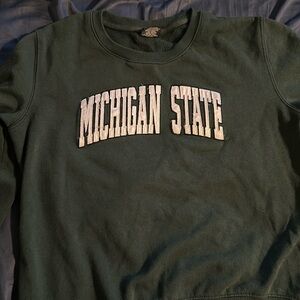 Size m in women’s Michigan state sweatshirt size M good condition.